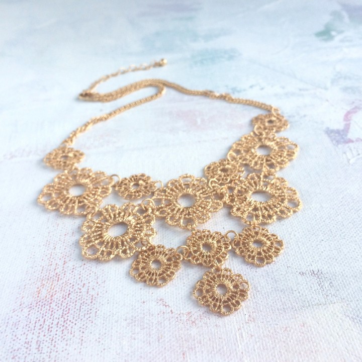 gold coloured lace necklace